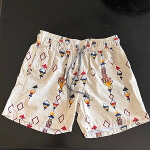 PANGEA Cream Swim Shorts with Colorful Berber Geometric Print